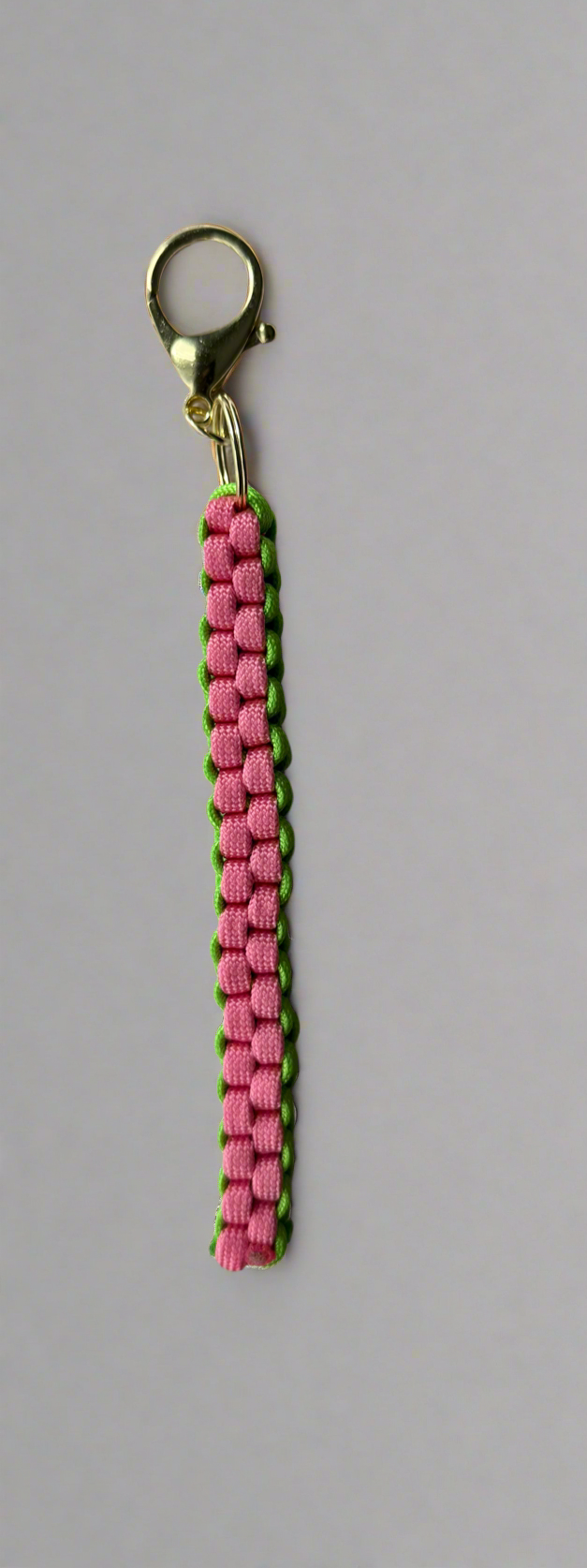 Custom pink and green cord bag charm